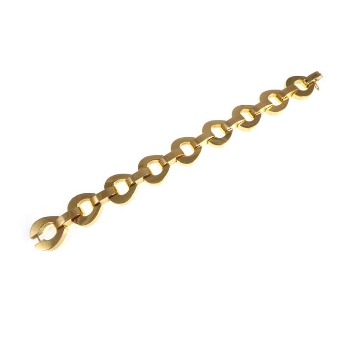 Gold bold link bracelet, the drop shaped links of square section